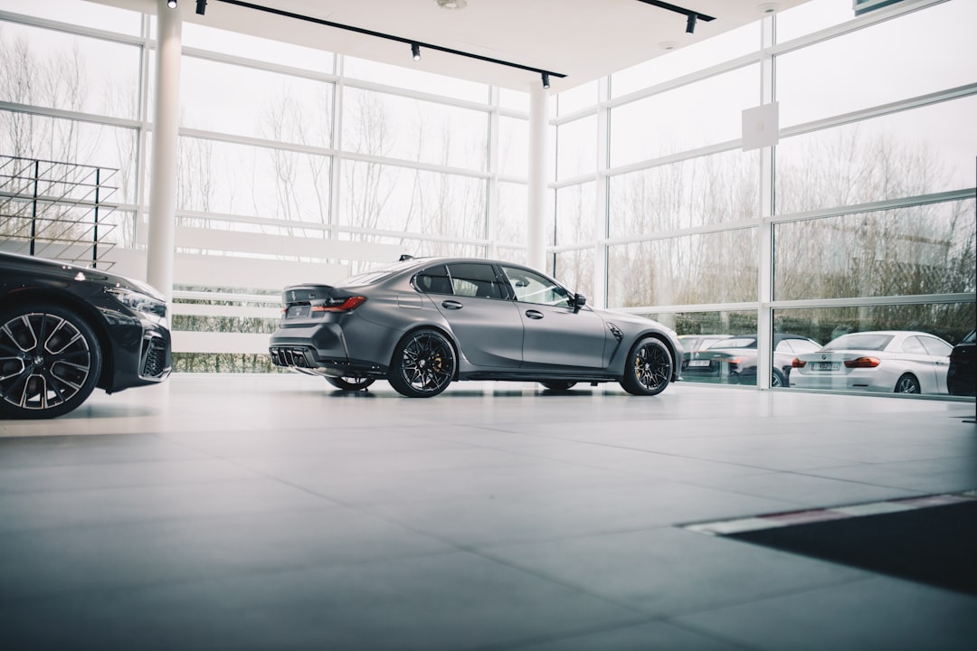 black-coupe-parked-in-a-building-9njclq6gpg0